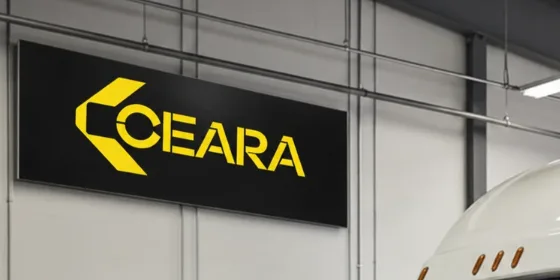 Placa da Ceará na parede de uma oficina de caminhões